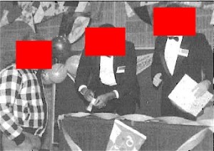 These well-dressed greeters actually were part of a federal undercover operation dubbed "No Such Thing as a Free Lunch." Source: U.S. Marshals Service. Red blocks by PP Blog.
